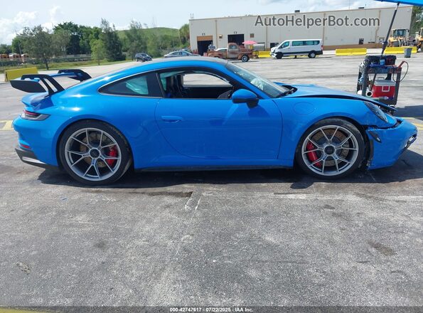 WP0AC2A92PS271046 2023 PORSCHE 911 Blue Vista interior trasera