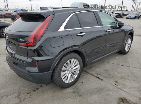 1GYAZAR48RF212347 2024 CADILLAC XT4 Black 
