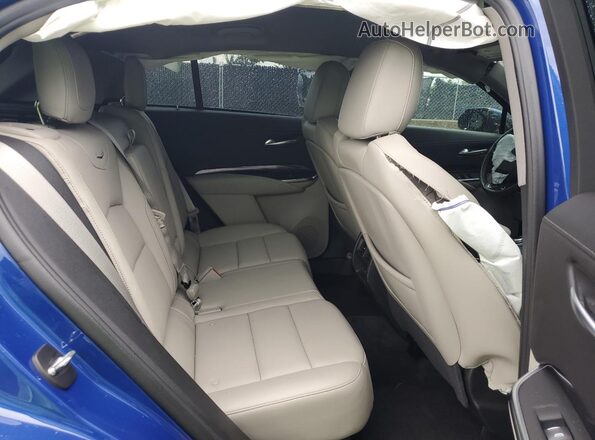 1GYAZAR45PF107584 2023 CADILLAC XT4 Blue 