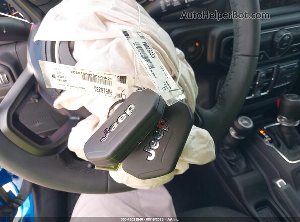 1C4HJXDG8PW518333 2023 JEEP WRANGLER Синий Вид панели приборов