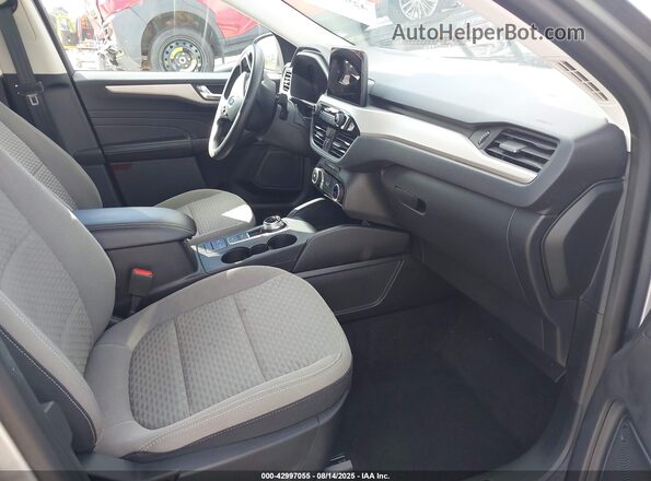 1FMCU0G64MUB03184 2021 FORD ESCAPE Silver Front interior view