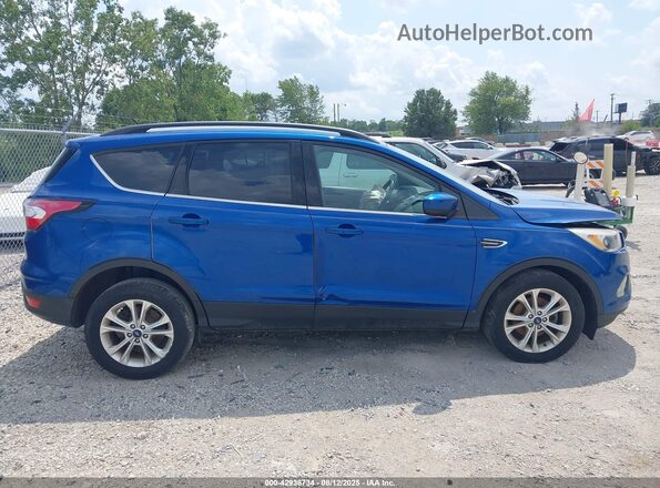 1FMCU0GDXJUC28250 2018 FORD ESCAPE Blue Widok wnętrza z tyłu