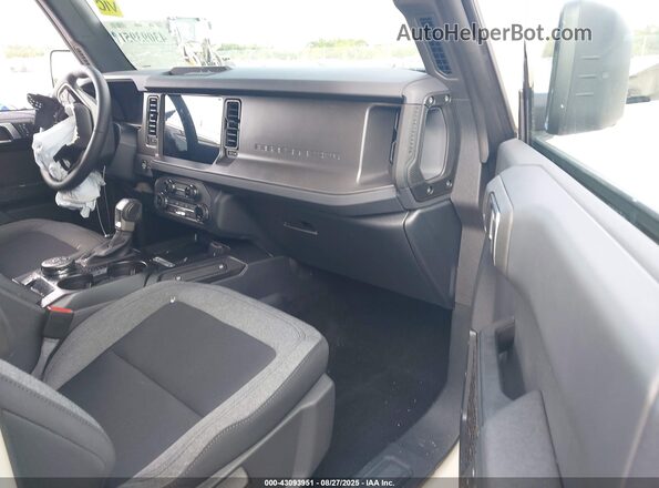1FMDE7BH2SLB11631 2025 FORD BRONCO Бежевый Вид салона спереди