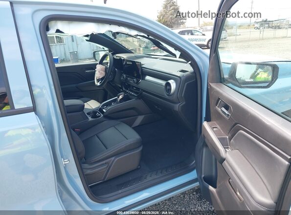 1GCPTCEK0S1180238 2025 CHEVROLET COLORADO Синий Вид салона спереди