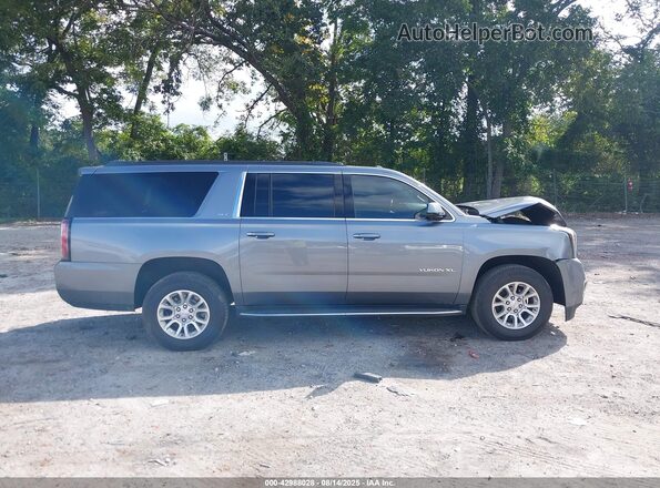 1GKS2GKC0LR240348 2020 GMC YUKON Gray Rear interior view