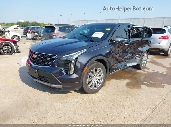 1GYFZCR42PF210902 2023 CADILLAC XT4 Black 