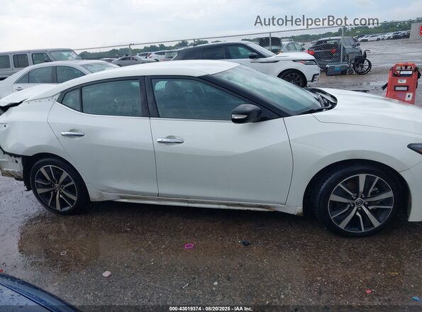 1N4AA6CV5MC515386 2021 NISSAN MAXIMA White Widok wnętrza z tyłu