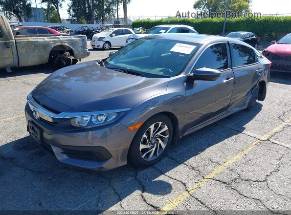 2HGFC2F77JH574000 2018 HONDA CIVIC Gray 