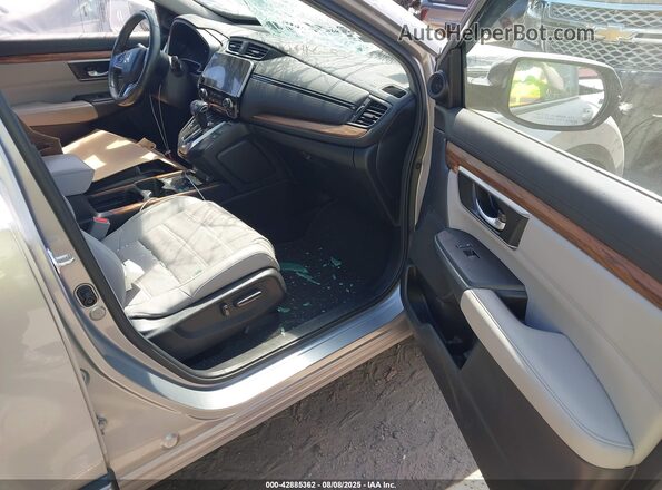 2HKRW2H90MH660987 2021 HONDA CR-V Серебряный Вид салона спереди