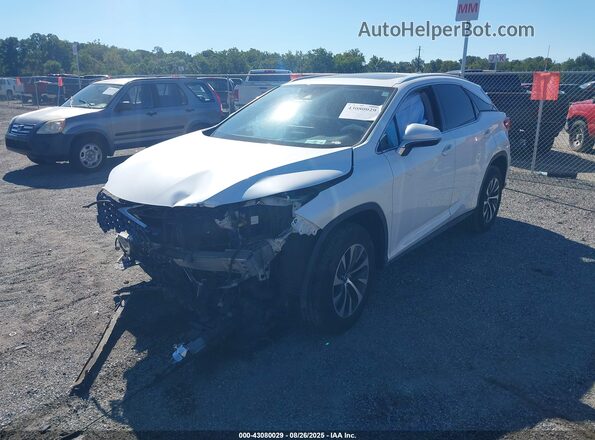 2T2HZMDA4LC232058 2020 LEXUS RX White Vista tres cuartos delantera izquierda