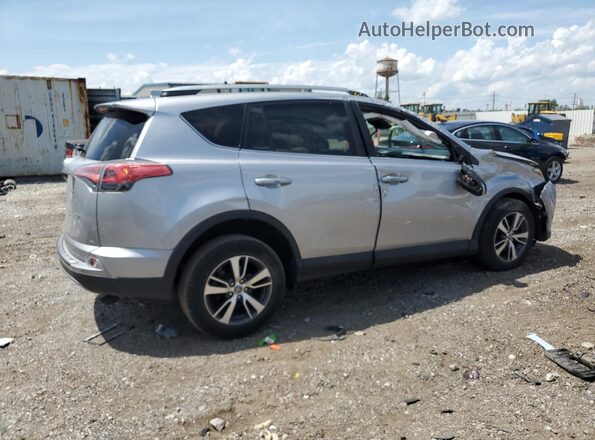 2T3WFREV6JW407299 2018 TOYOTA RAV4 Silver 