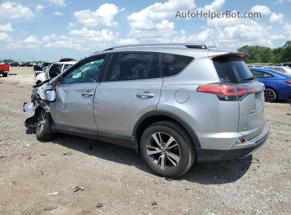2T3WFREV6JW407299 2018 TOYOTA RAV4 Silver 