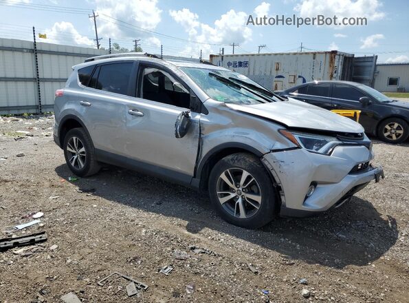 2T3WFREV6JW407299 2018 TOYOTA RAV4 Silver 