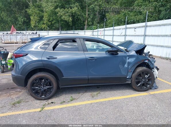 3MVDMBCM7RM647584 2024 MAZDA CX-30 Gray Widok wnętrza z tyłu