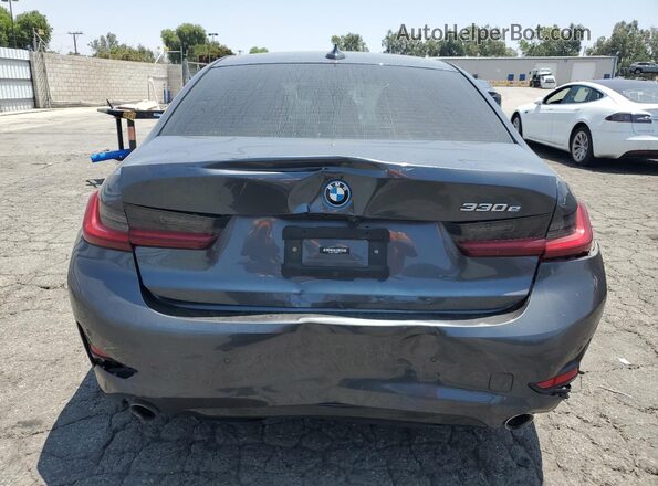 3MW5P7J02N8C41223 2022 BMW 3 SERIES Charcoal Rear view