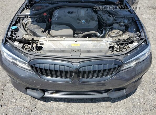 3MW5P7J02N8C41223 2022 BMW 3 SERIES Charcoal Rear interior view