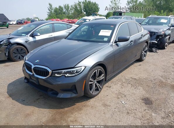 3MW5R7J00L8B07656 2020 BMW 3 SERIES Gray Vista tres cuartos delantera izquierda