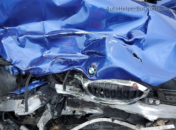 3MW5R7J05M8C00335 2021 BMW OTHER Blue Widok wnętrza z tyłu