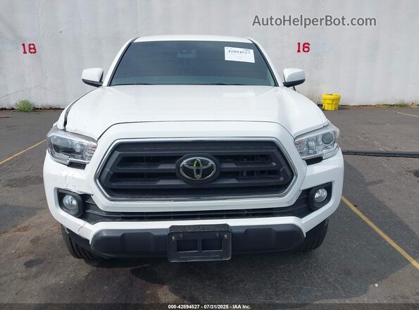 3TMCZ5ANXMM446072 2021 TOYOTA TACOMA White Սալոնի հետևի տեսք