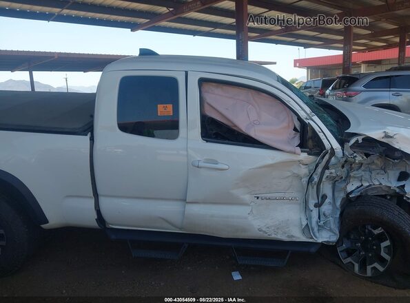 3TYSZ5AN2MT052114 2021 TOYOTA TACOMA White Widok naklejki z numerem VIN