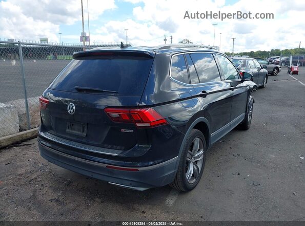3VV2B7AXXLM152054 2020 VOLKSWAGEN TIGUAN Black Tył prawy