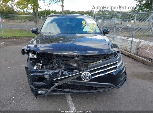 3VV2B7AXXLM152054 2020 VOLKSWAGEN TIGUAN Black Widok z przodu