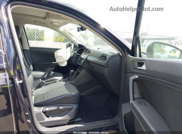 3VV2B7AXXLM152054 2020 VOLKSWAGEN TIGUAN Black Widok wnętrza z przodu