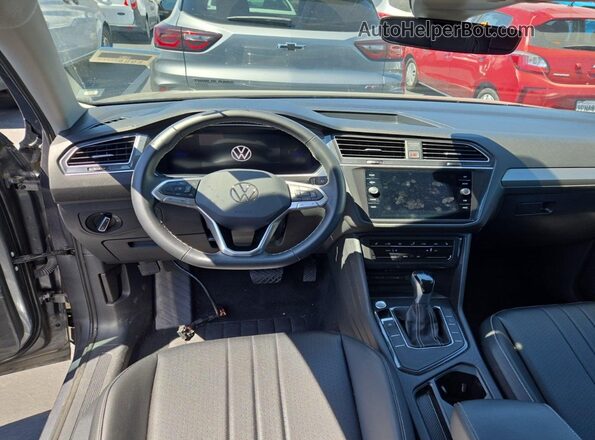 3VV3B7AX3RM106059 2024 VOLKSWAGEN TIGUAN  Вид сзади