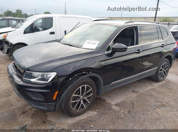 3VV3B7AXXMM016531 2021 VOLKSWAGEN TIGUAN Black წინა მარცხენა ხედი სამი მეოთხედიდან