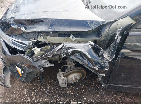 3VVCB7AX2PM079191 2023 VOLKSWAGEN TIGUAN Black Front view