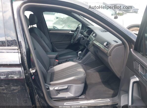 3VVCB7AX2PM079191 2023 VOLKSWAGEN TIGUAN Black Front interior view