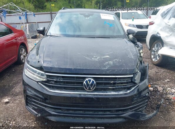 3VVCB7AX2PM079191 2023 VOLKSWAGEN TIGUAN Black Rear interior view