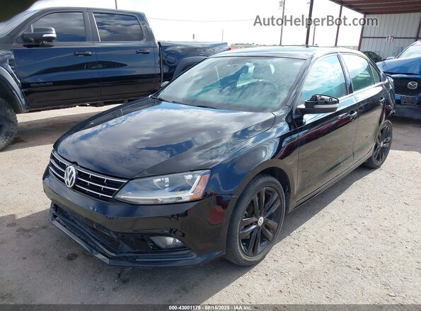 3VWD17AJ5JM209986 2018 VOLKSWAGEN JETTA Black 