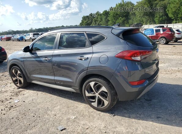 KM8J3CA25JU611614 2018 HYUNDAI TUCSON Серый 