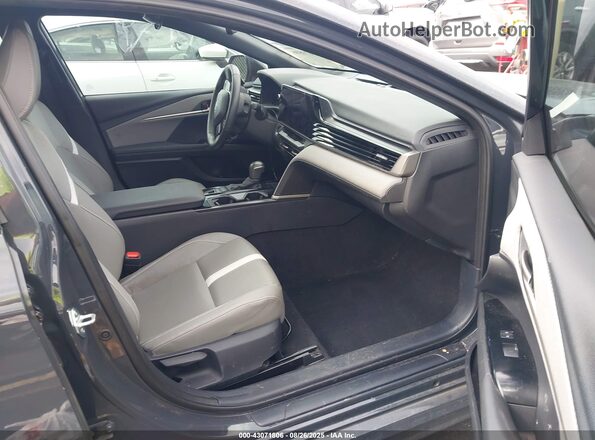 4T1DAACK5SU072885 2025 TOYOTA CAMRY Серый Вид салона спереди