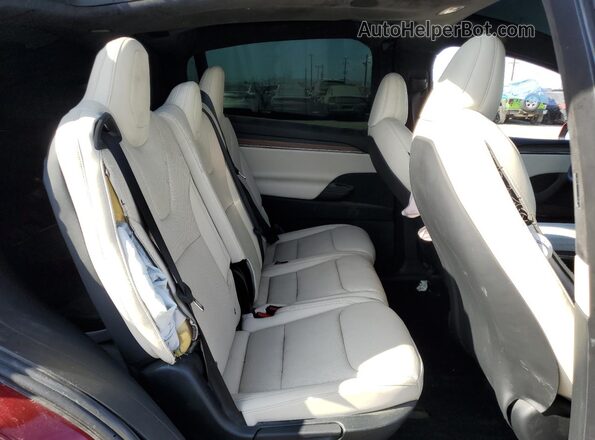 7SAXCAE57RF444414 2024 TESLA MODEL Red Вид задньої частини салону