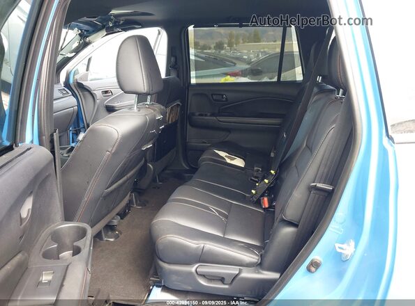 5FNYF8H64SB018935 2025 HONDA PASSPORT Light Blue Vista de la etiqueta del VIN