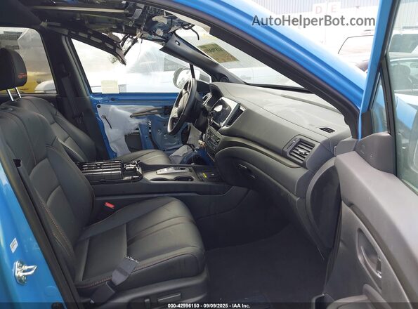 5FNYF8H64SB018935 2025 HONDA PASSPORT Light Blue Vista interior delantera