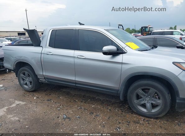 5FPYK3F72MB003645 2021 HONDA RIDGELINE Gray Vista interior trasera