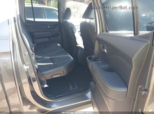 5FPYK3F74MB004599 2021 HONDA RIDGELINE Tan Вид наклейки з VIN-кодом