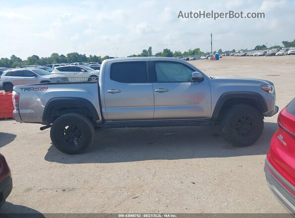 5TFCZ5ANXMX268304 2021 TOYOTA TACOMA Серебряный Вид задней части салона
