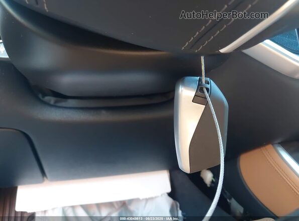 5UX13EU0XS9W62667 2025 BMW X5 Black Vista del salpicadero