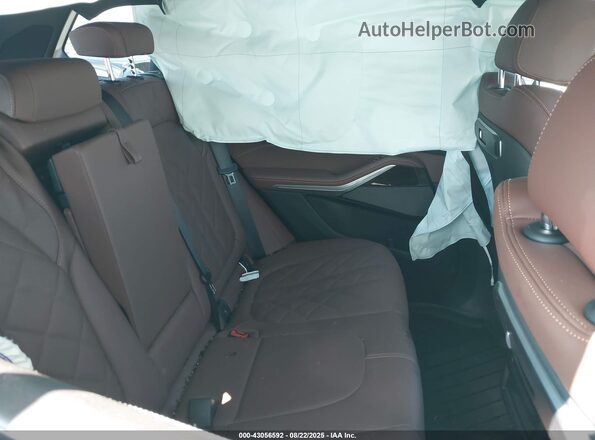 5UX23EU00R9V78243 2024 BMW X5 Teal Vista de la etiqueta del VIN