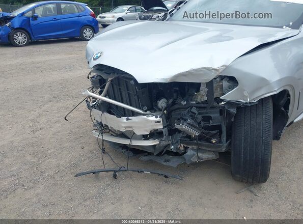 5UX2V1C03L9B30237 2020 BMW X4 Silver Front view