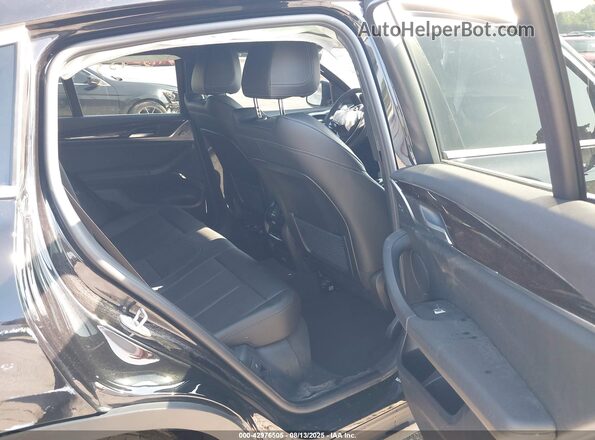 5UX33DT09R9W18478 2024 BMW X4 Black VIN კოდის სტიკერის ხედი