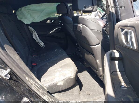 5UX33EX00T9117616 2026 BMW X6 Black Widok naklejki z numerem VIN