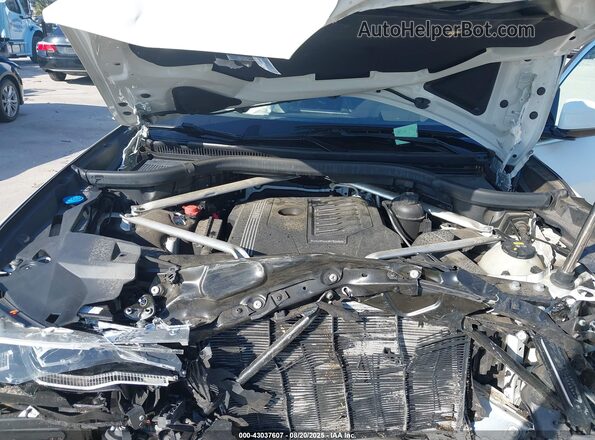 5UXCW2C05L9C50869 2020 BMW X7 White Widok z tyłu