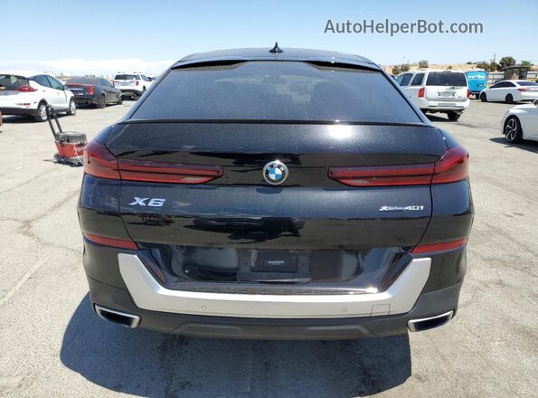 5UXCY6C00L9C74787 2020 BMW X6 Black Вид салону спереду