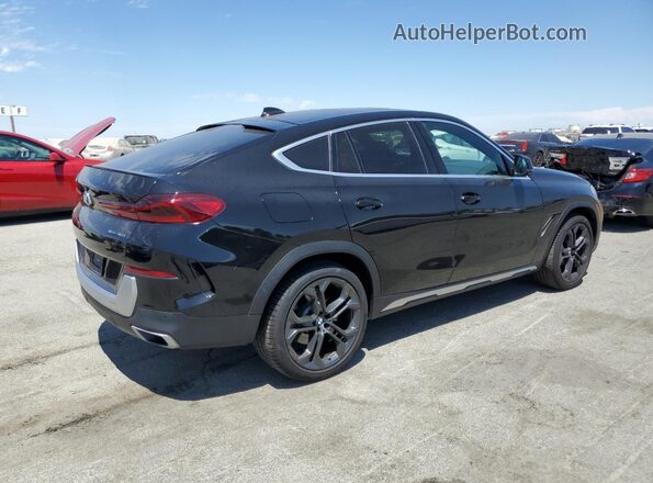5UXCY6C00L9C74787 2020 BMW X6 Black Передня права чверть