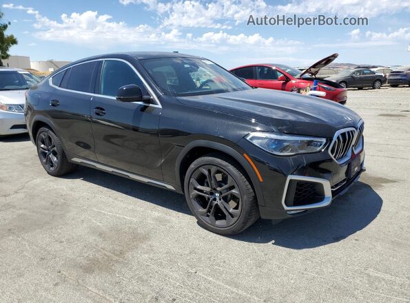 5UXCY6C00L9C74787 2020 BMW X6 Black Вид спереду